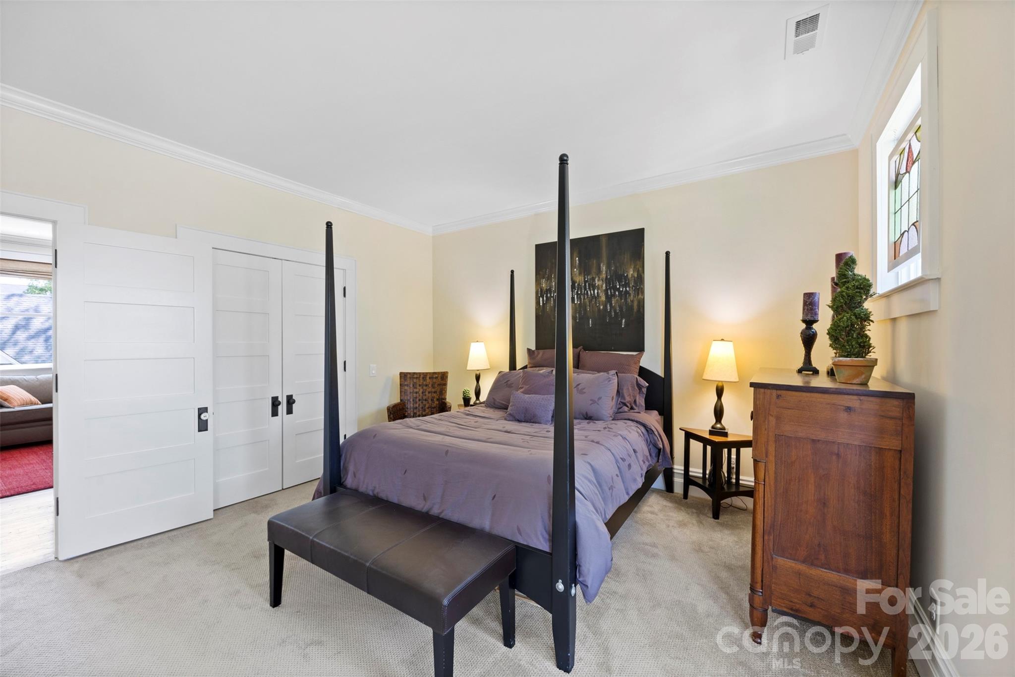 207 West Academy Street Cherryville, NC 28021 - Photo 33 of 45 a bedroom with a bed and wooden floor