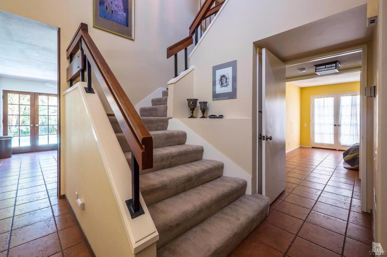 11529 East Buttercreek Road Moorpark, CA 93021 - Photo 19 of 36 a living room with furniture and a gate
