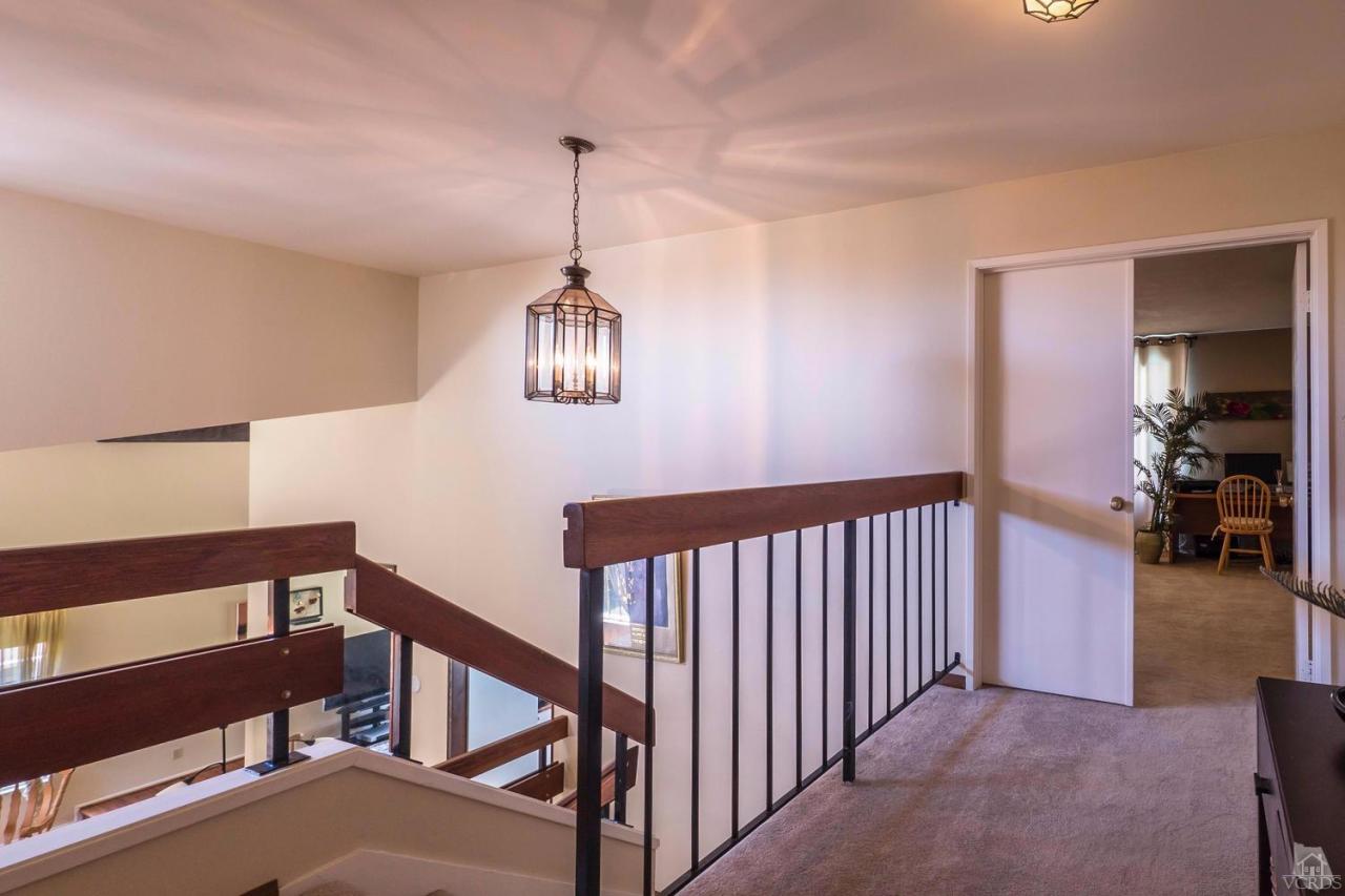 11529 East Buttercreek Road Moorpark, CA 93021 - Photo 22 of 36 a view of a hallway view with staircase