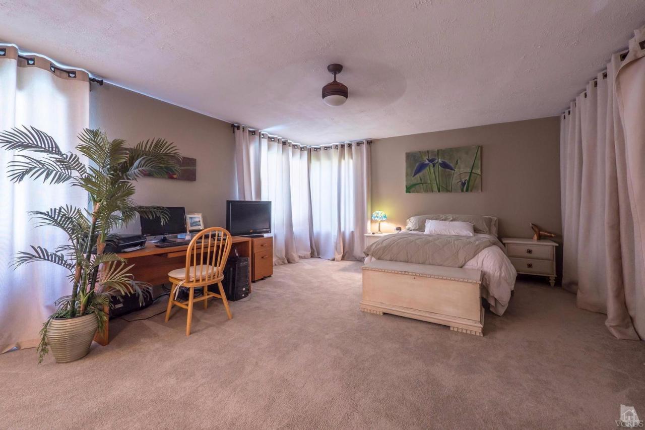 11529 East Buttercreek Road Moorpark, CA 93021 - Photo 23 of 36 a bedroom with furniture and a window