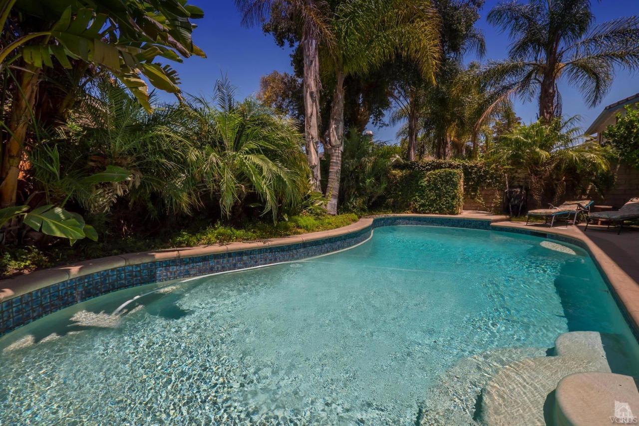 11529 East Buttercreek Road Moorpark, CA 93021 - Photo 33 of 36 a view of a backyard with swimming pool