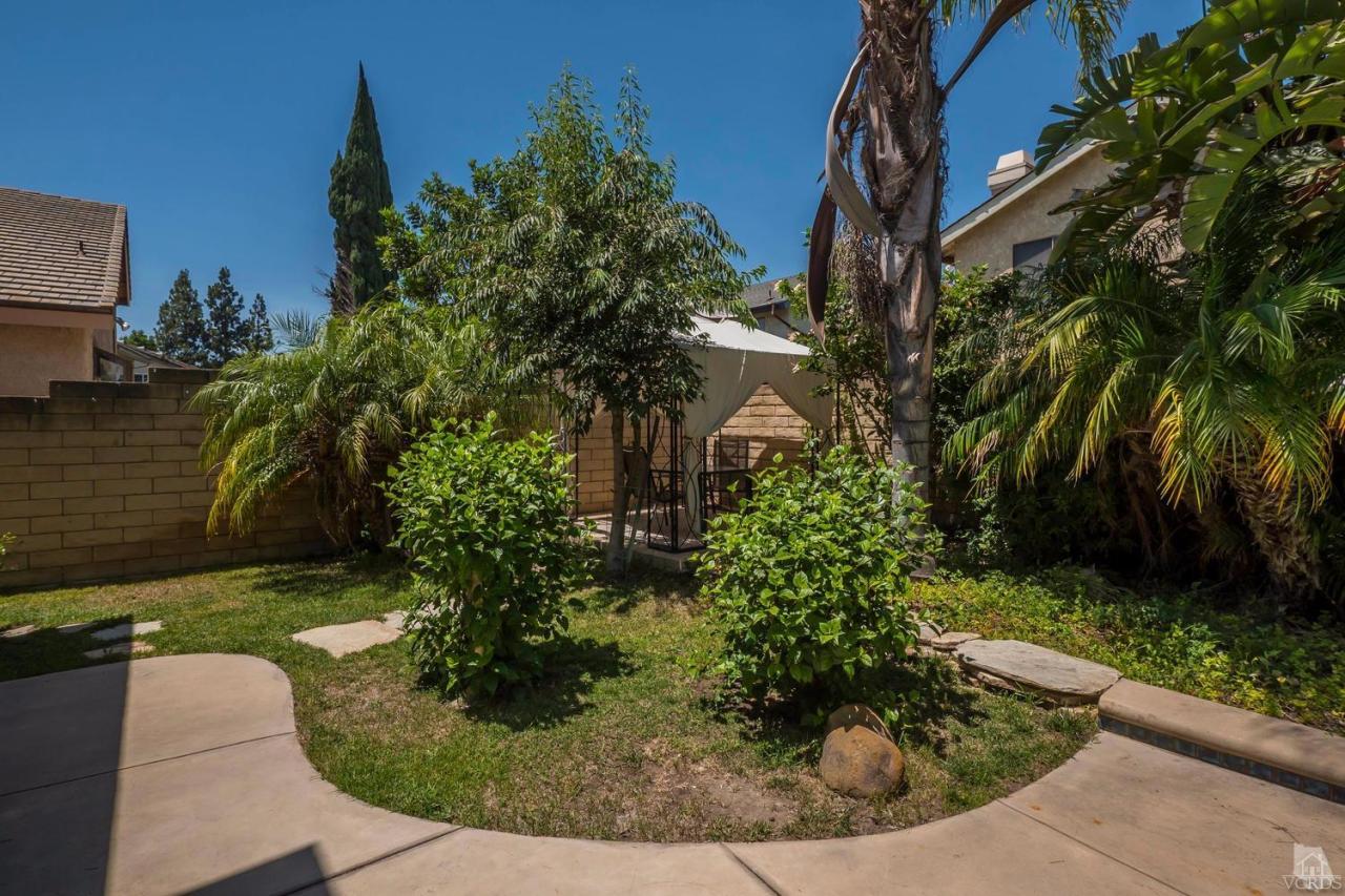 11529 East Buttercreek Road Moorpark, CA 93021 - Photo 35 of 36 a view of a yard with plants