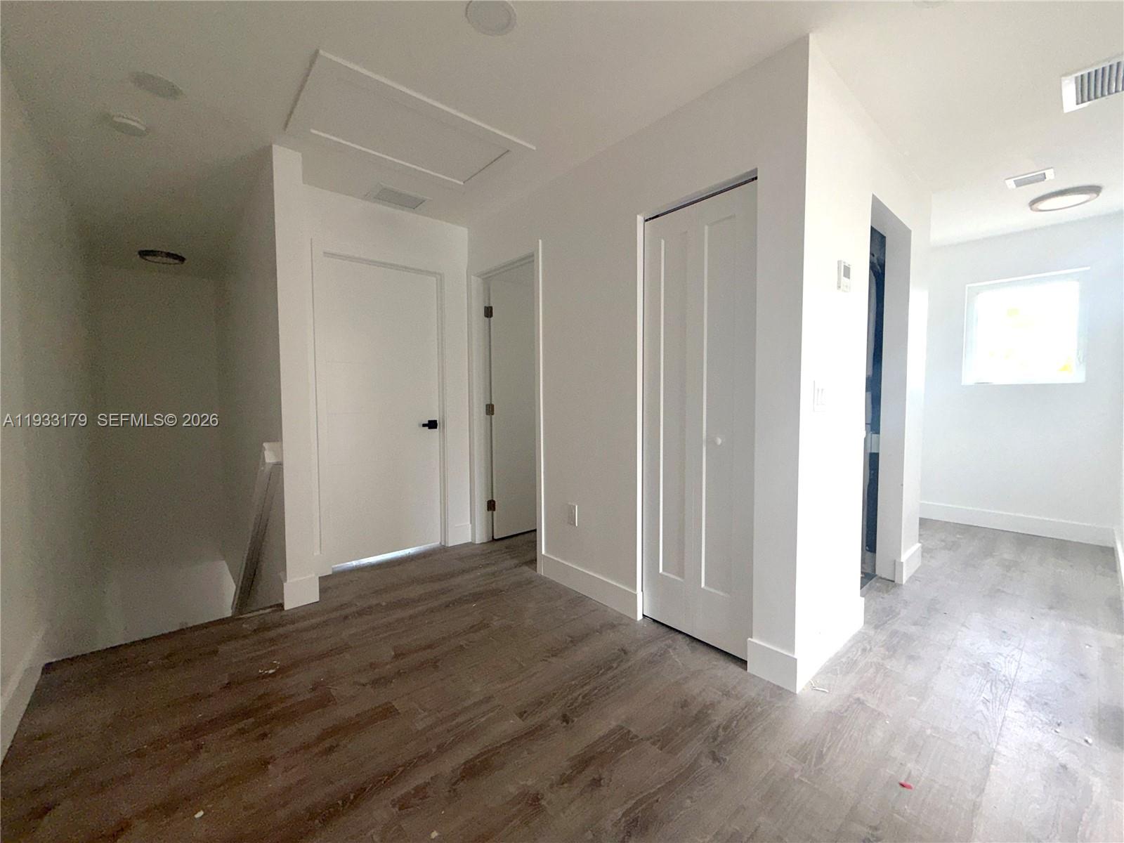 1629 Northwest 40th Street Miami, FL 33142 - Photo 13 of 17 a view of entryway with wooden floor