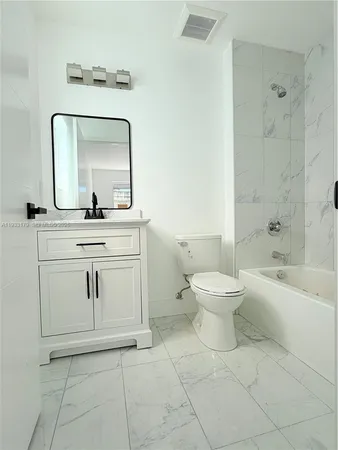 $1,074,999 | 1629 Northwest 40th Street, Miami, FL 33142