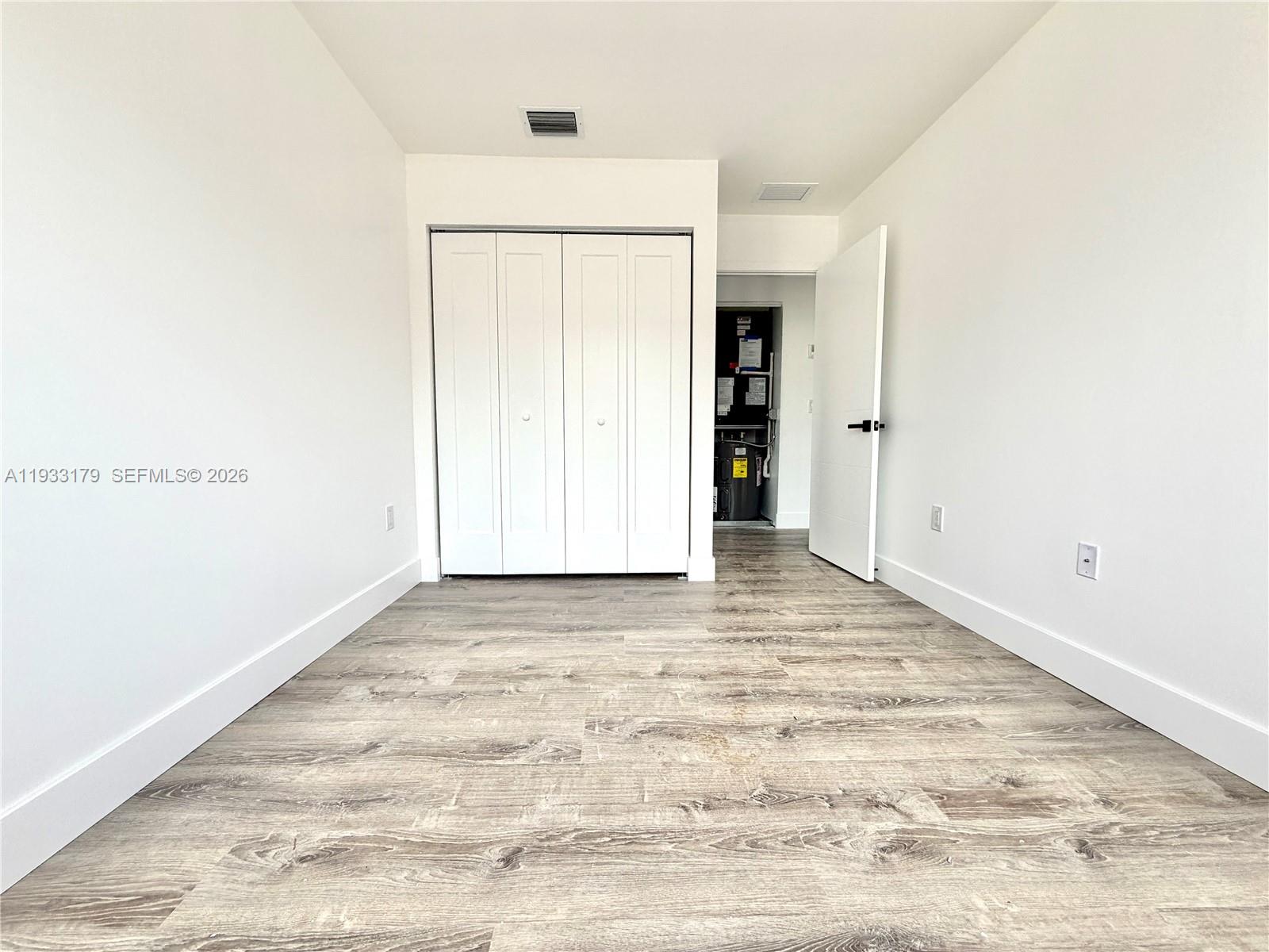 1629 Northwest 40th Street Miami, FL 33142 - Photo 8 of 17 a view of empty room