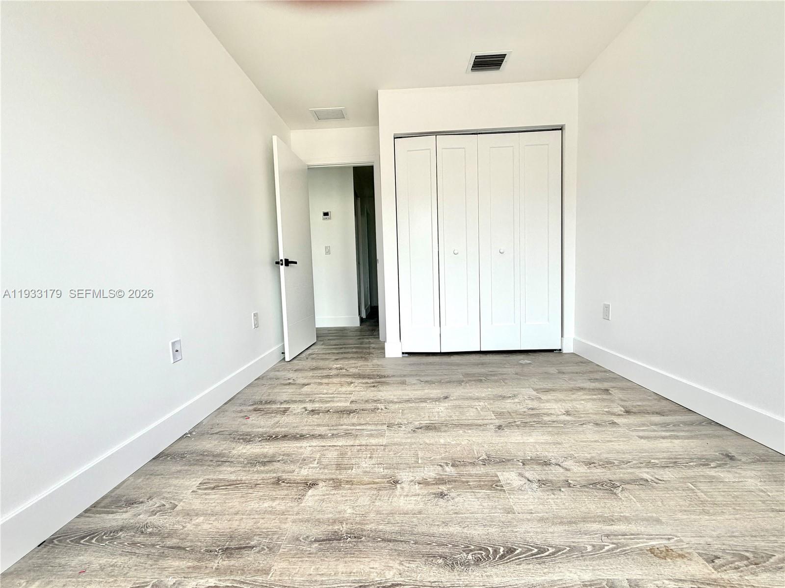 1629 Northwest 40th Street Miami, FL 33142 - Photo 10 of 17 a view of an empty room
