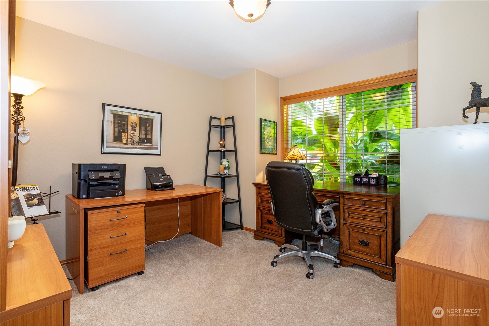 23408 Southeast 216th Way Maple Valley, WA 98038 - Photo 11 of 40 a view of a workspace with furniture and a window