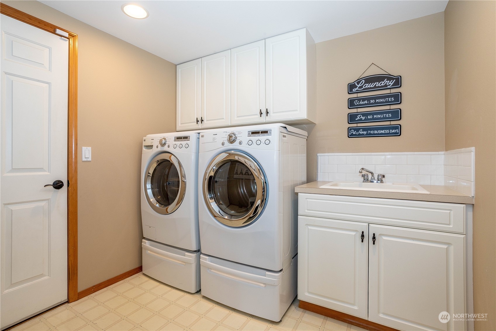 23408 Southeast 216th Way Maple Valley, WA 98038 - Photo 19 of 40 a utility room with dryer and washer