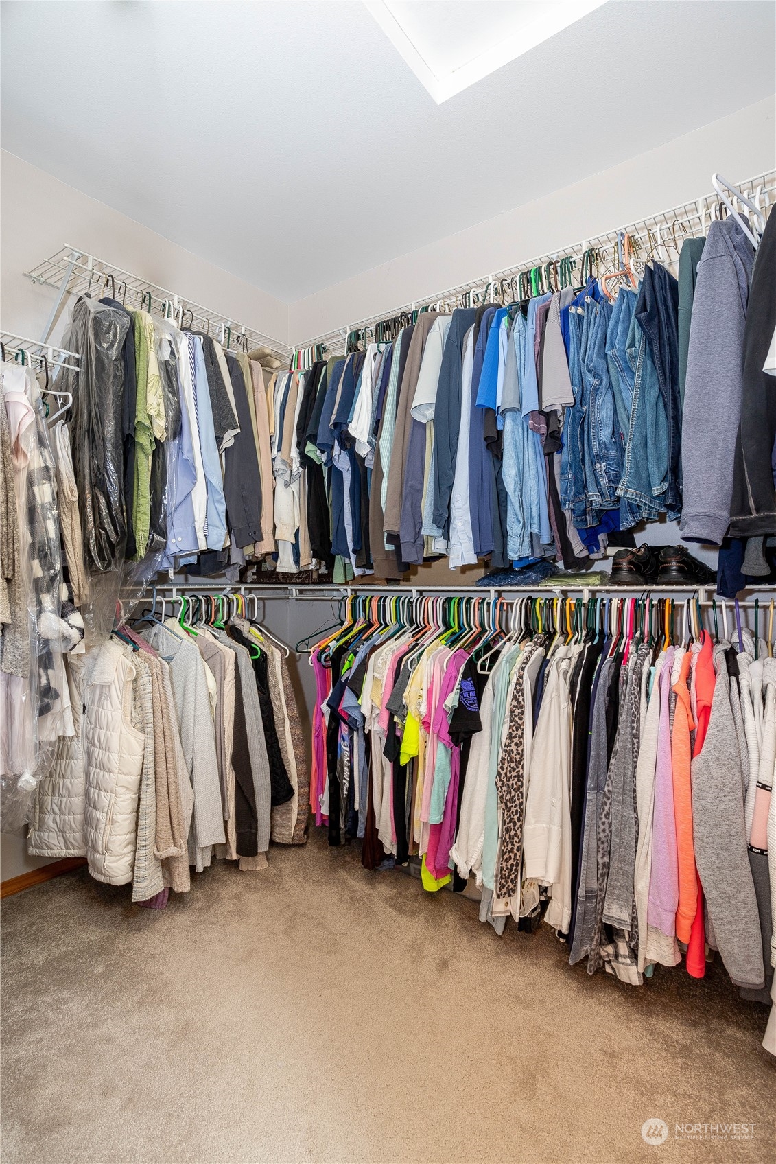 23408 Southeast 216th Way Maple Valley, WA 98038 - Photo 27 of 40 a view of walk in closet with clothes