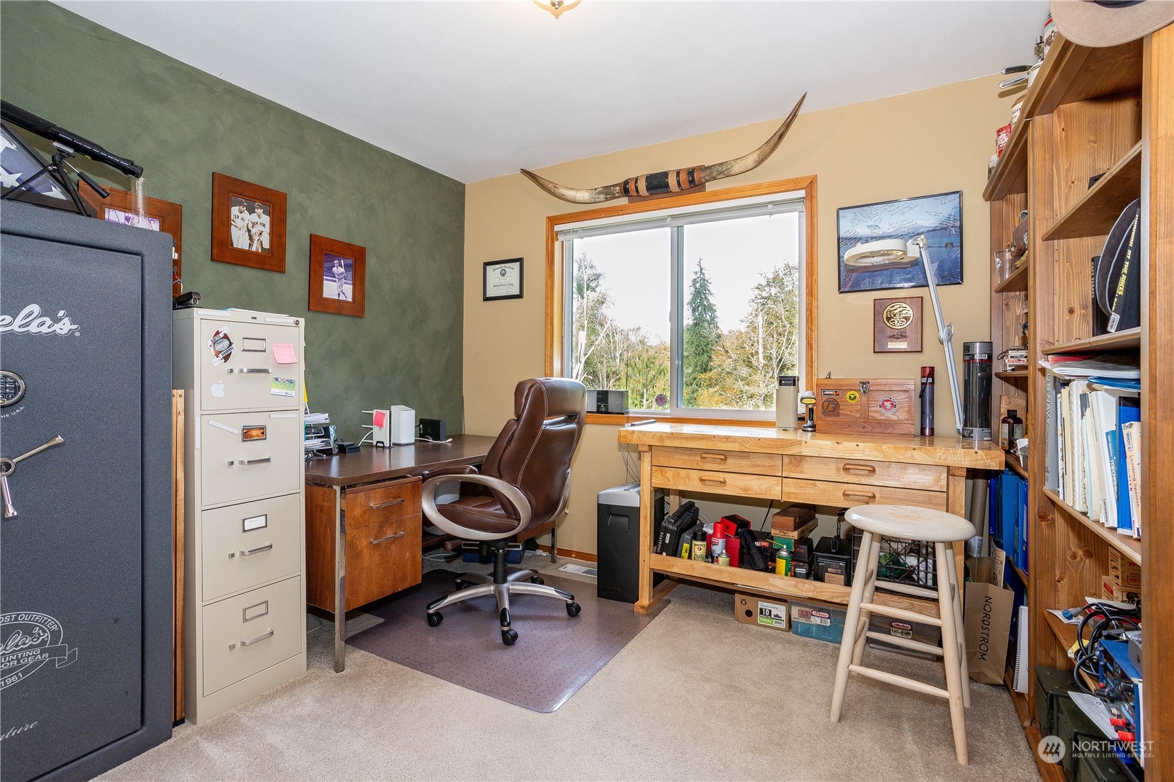 23408 Southeast 216th Way Maple Valley, WA 98038 - Photo 28 of 40 a view of a workspace with furniture and a window