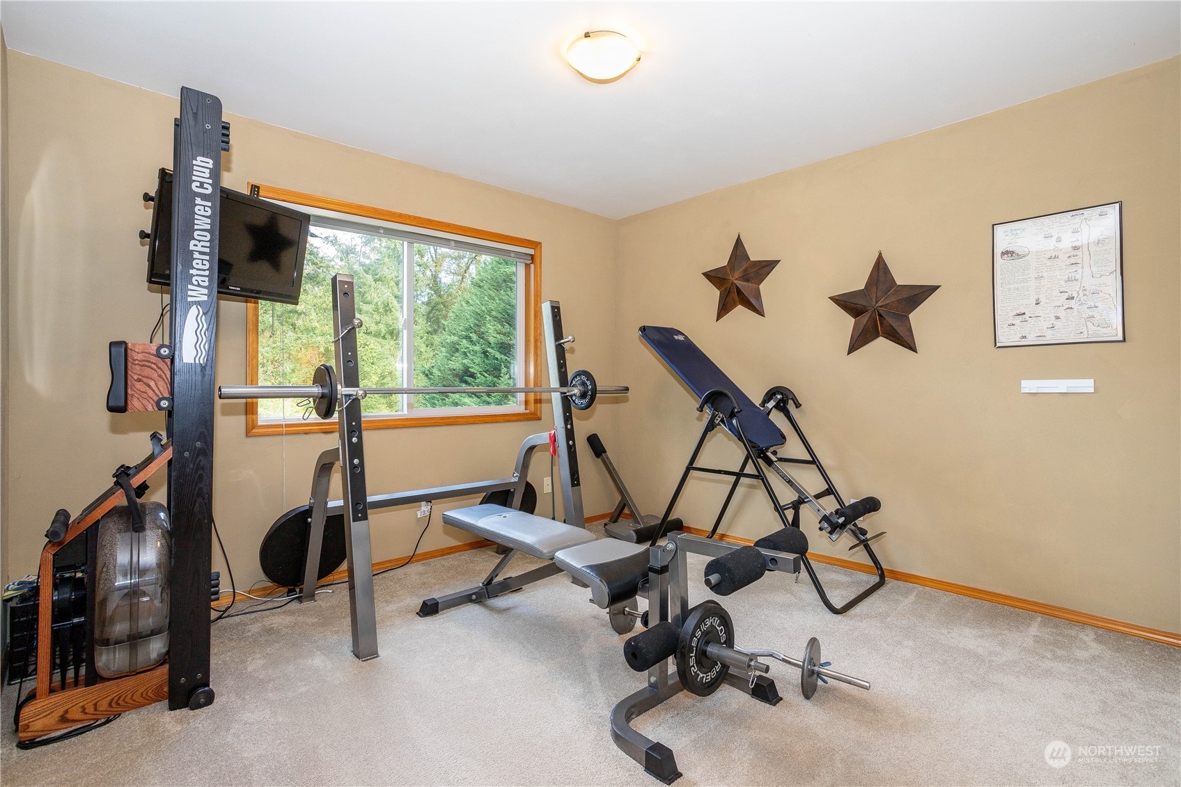 23408 Southeast 216th Way Maple Valley, WA 98038 - Photo 30 of 40 a view of a room with gym equipment
