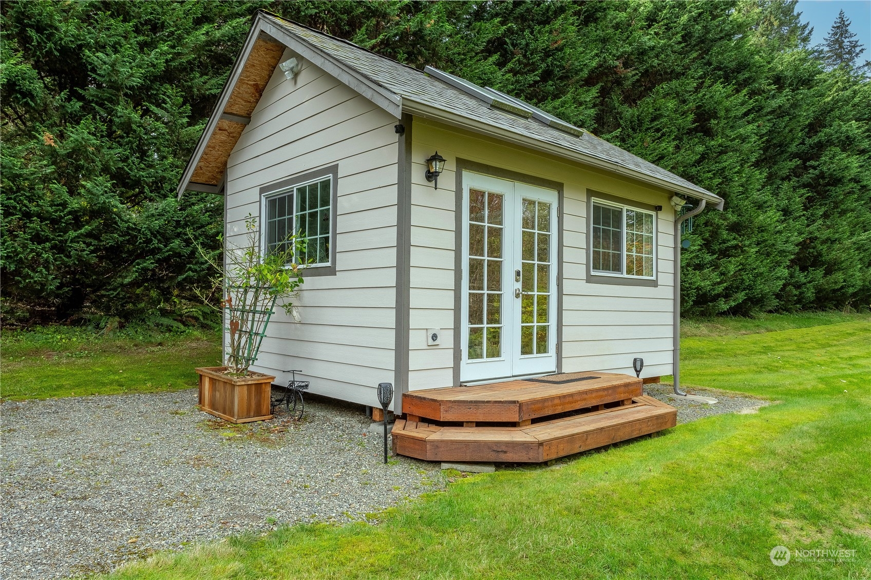 23408 Southeast 216th Way Maple Valley, WA 98038 - Photo 37 of 40 a front view of a house with a yard