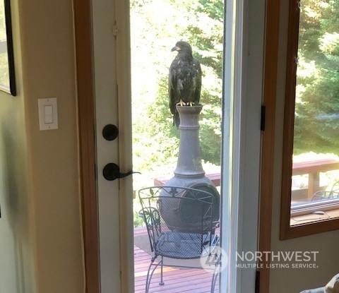 23408 Southeast 216th Way Maple Valley, WA 98038 - Photo 40 of 40 a view of a hallway with a window