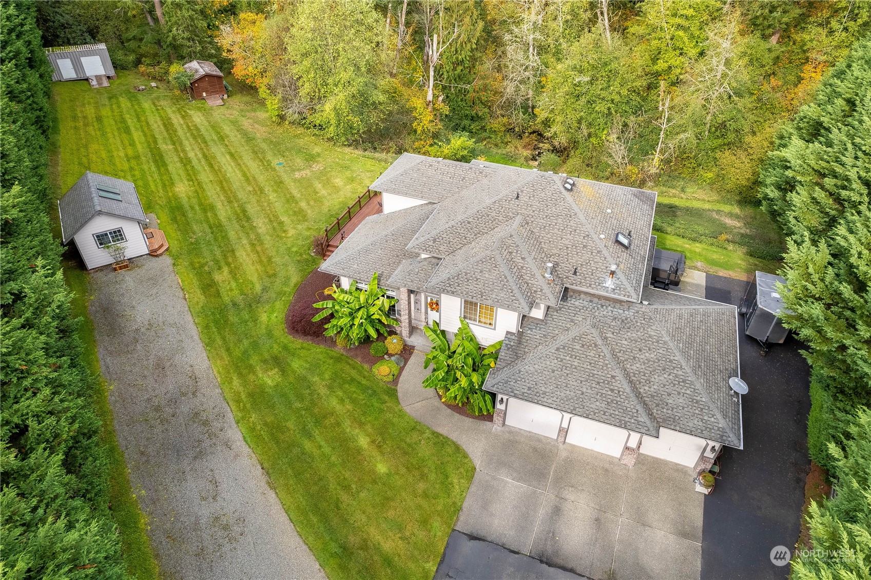 23408 Southeast 216th Way Maple Valley, WA 98038 - Photo 4 of 40 an aerial view of a house with a yard