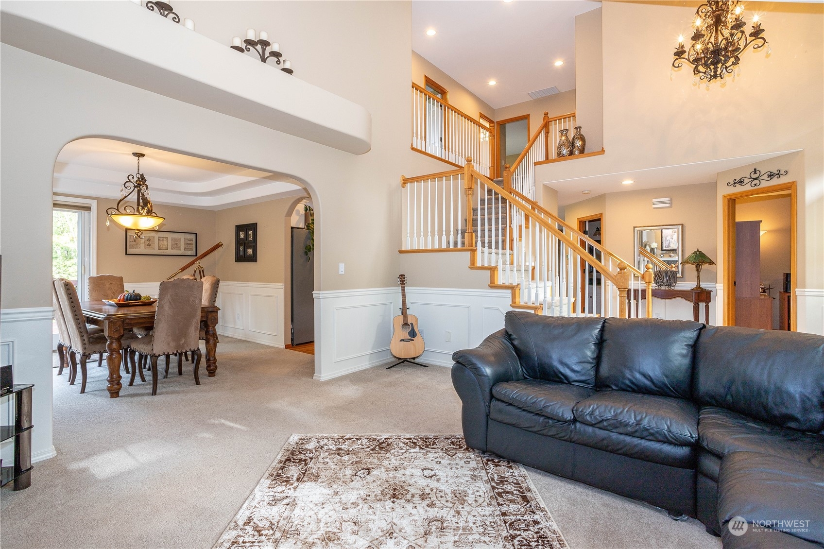 23408 Southeast 216th Way Maple Valley, WA 98038 - Photo 9 of 40 a living room with furniture and a dining table