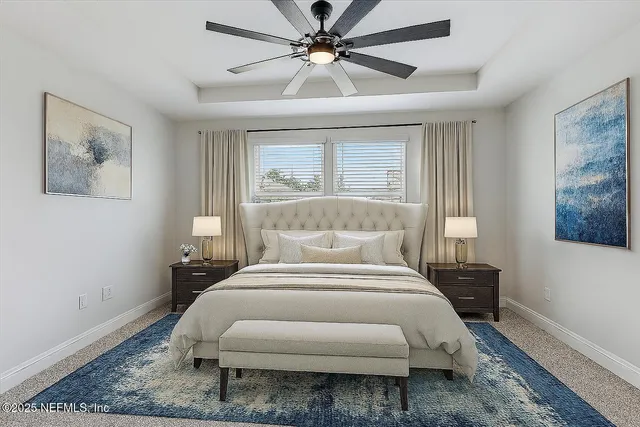 a bed room with a bed and a window