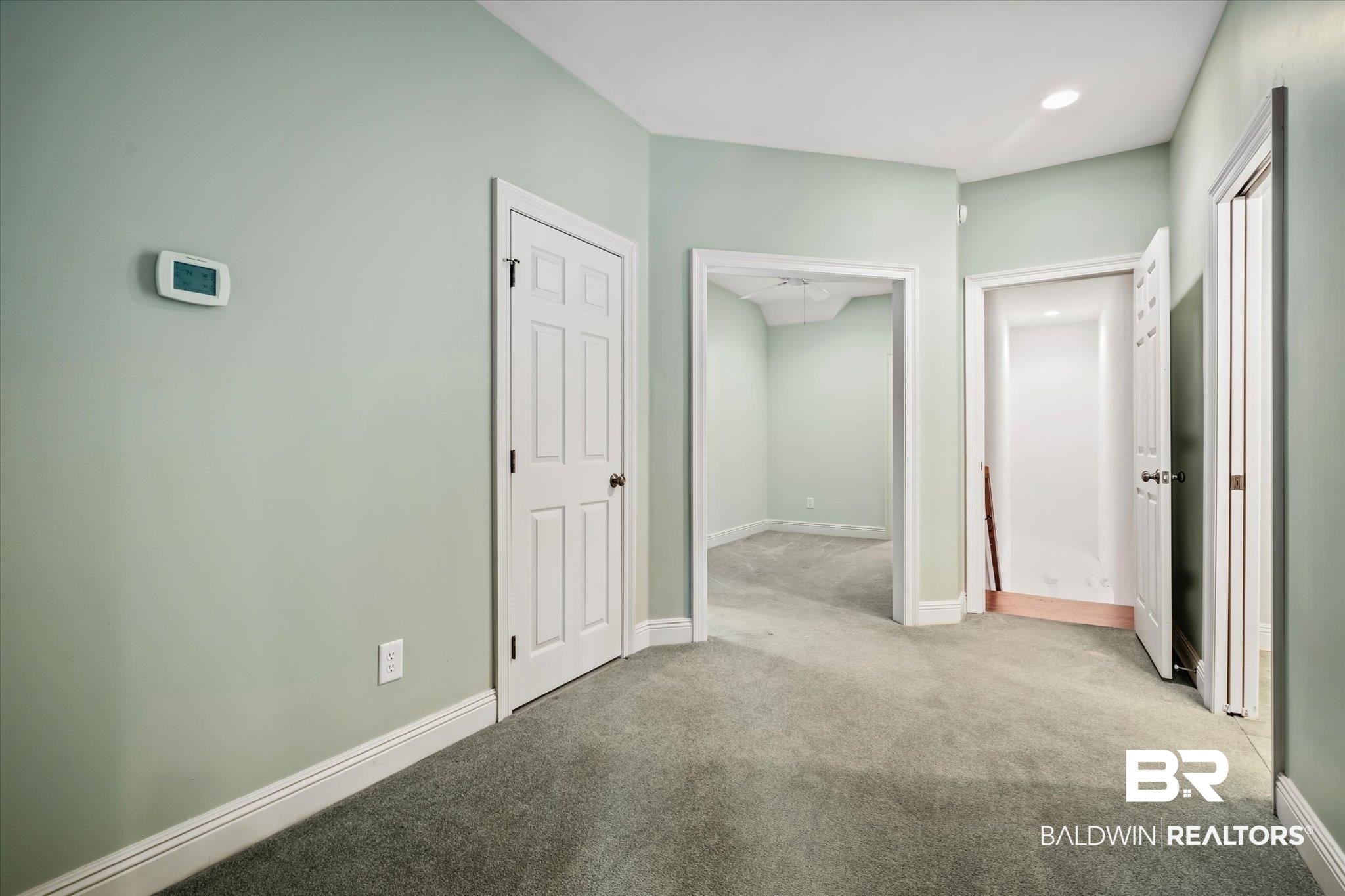 812 Country Club Court Mobile, AL 36609 - Photo 18 of 34 Interior space with light colored carpet