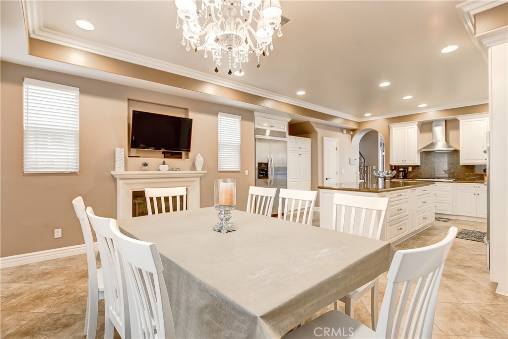 213 Baltimore Avenue Huntington Beach, CA 92648 - Photo 22 of 50 a view of a dining room with furniture
