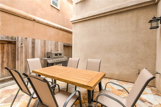 a view of a balcony with furniture