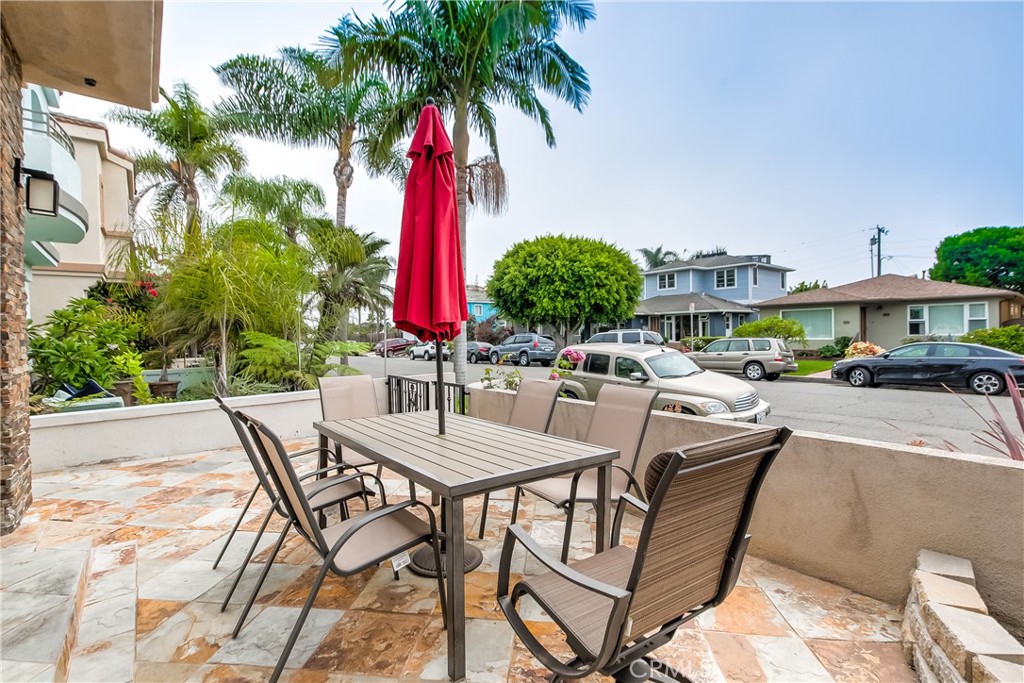 213 Baltimore Avenue Huntington Beach, CA 92648 - Photo 7 of 50 a view of a chairs and table in patio