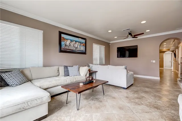 a living room with furniture and a couch