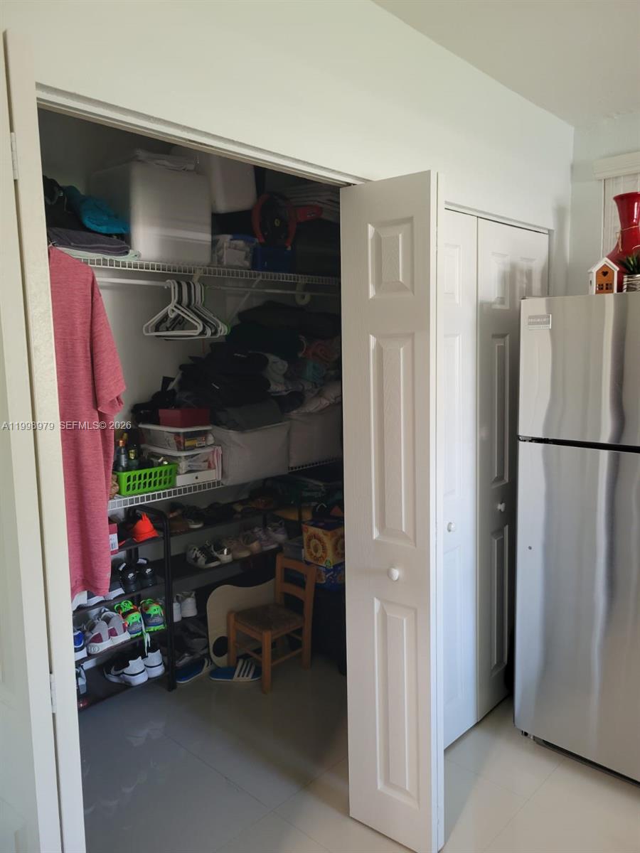 8245 Southwest 43rd Street Miami, FL 33155 - Photo 18 of 24 a room with storage and utility