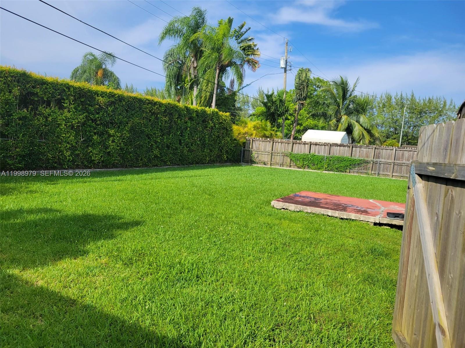 8245 Southwest 43rd Street Miami, FL 33155 - Photo 21 of 24 a view of a park with a big yard