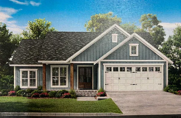 front view of a house with a yard