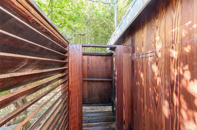 a view of outdoor space with wooden floor and deck