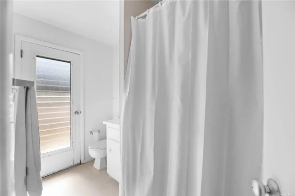 a bathroom with a sink and a toilet