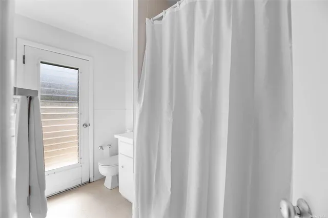 a bathroom with a sink and a toilet