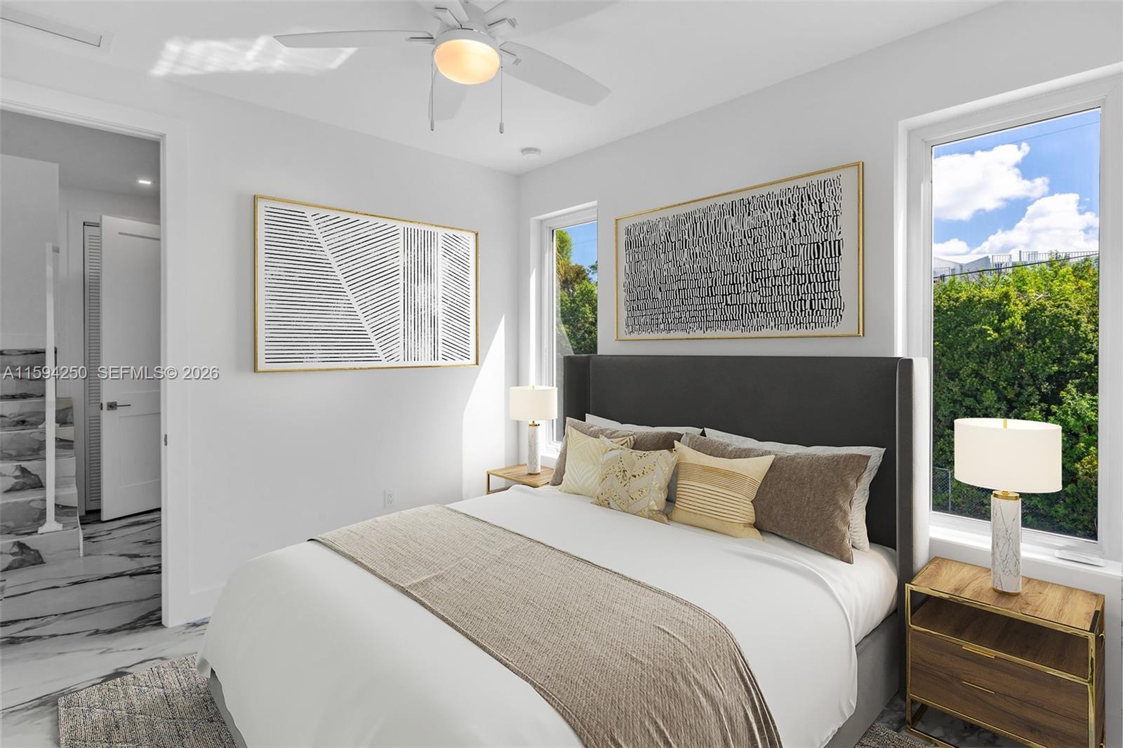 84 Coral Way Key Largo, FL 33037 - Photo 15 of 55 a bedroom with a bed and a window