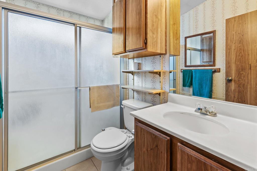 28890 Lilac Road, Unit 160 Valley Center, CA 92082 - Photo 19 of 30 a bathroom with a sink and a mirror