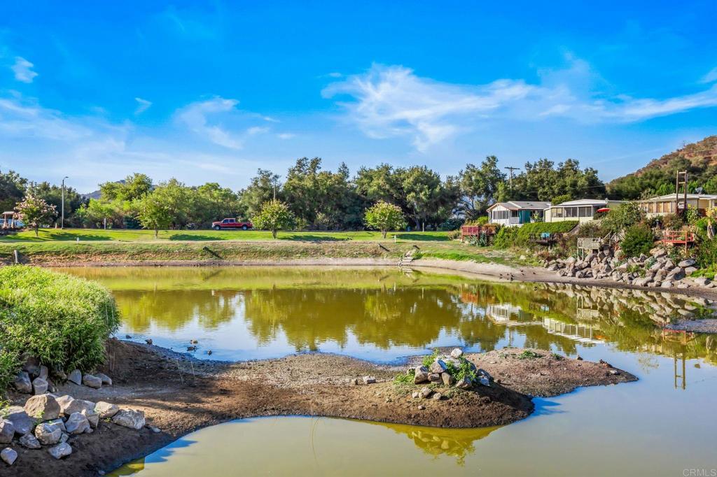 28890 Lilac Road, Unit 160 Valley Center, CA 92082 - Photo 28 of 30 a view of a swimming pool with an ocean view