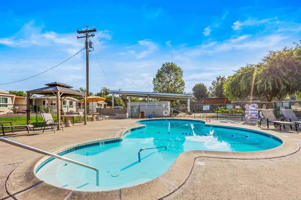 28890 Lilac Road, Unit 160 Valley Center, CA 92082 - Photo 29 of 30 a view of a swimming pool with a patio