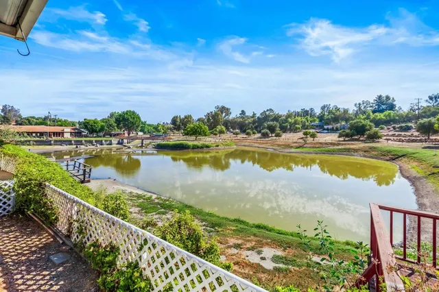 a view of a city and swimming pool