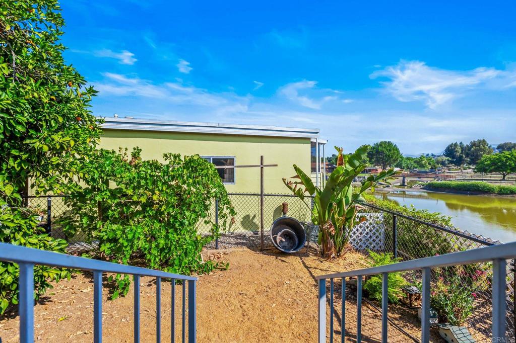 28890 Lilac Road, Unit 160 Valley Center, CA 92082 - Photo 7 of 30 a view of a chairs and table in patio