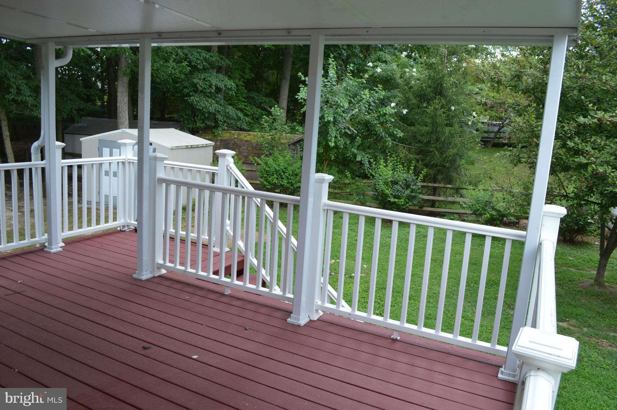 8604 Cottington Road Baltimore, MD 21236 - Photo 16 of 22 Yard view from the covered deck