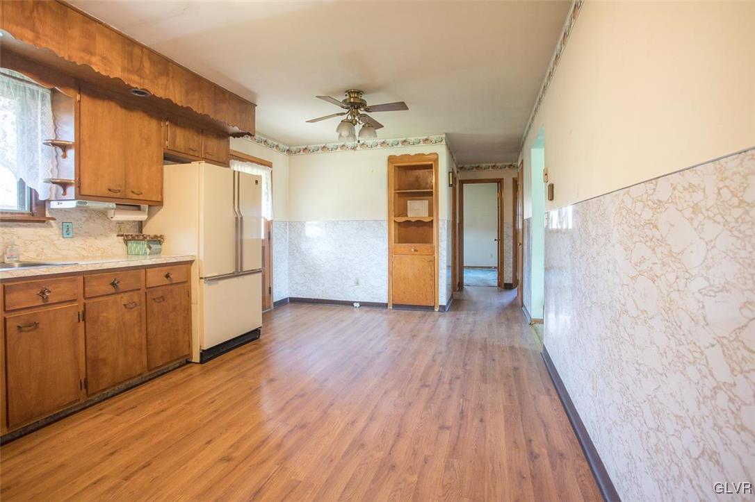 223 Grouse Drive Bath, PA 18014 - Photo 5 of 18 a kitchen with a refrigerator a sink and dishwasher with wooden floor