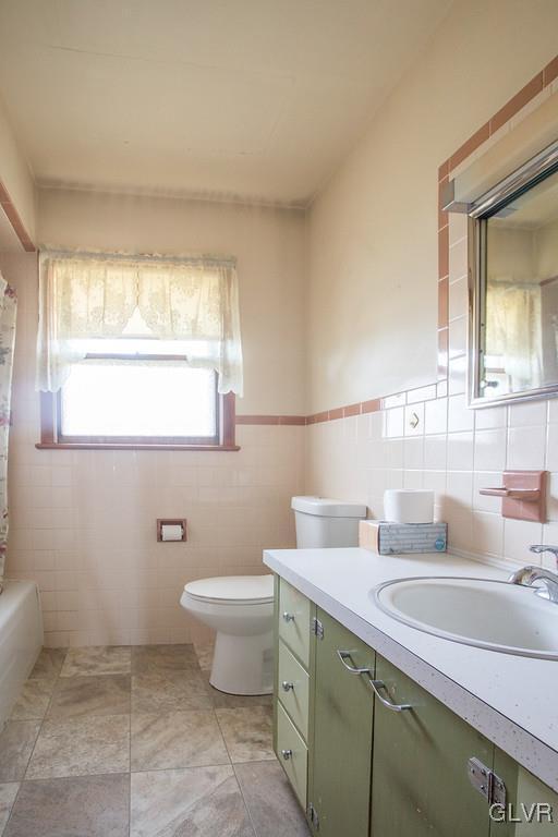 223 Grouse Drive Bath, PA 18014 - Photo 8 of 18 a bathroom with a sink toilet and mirror