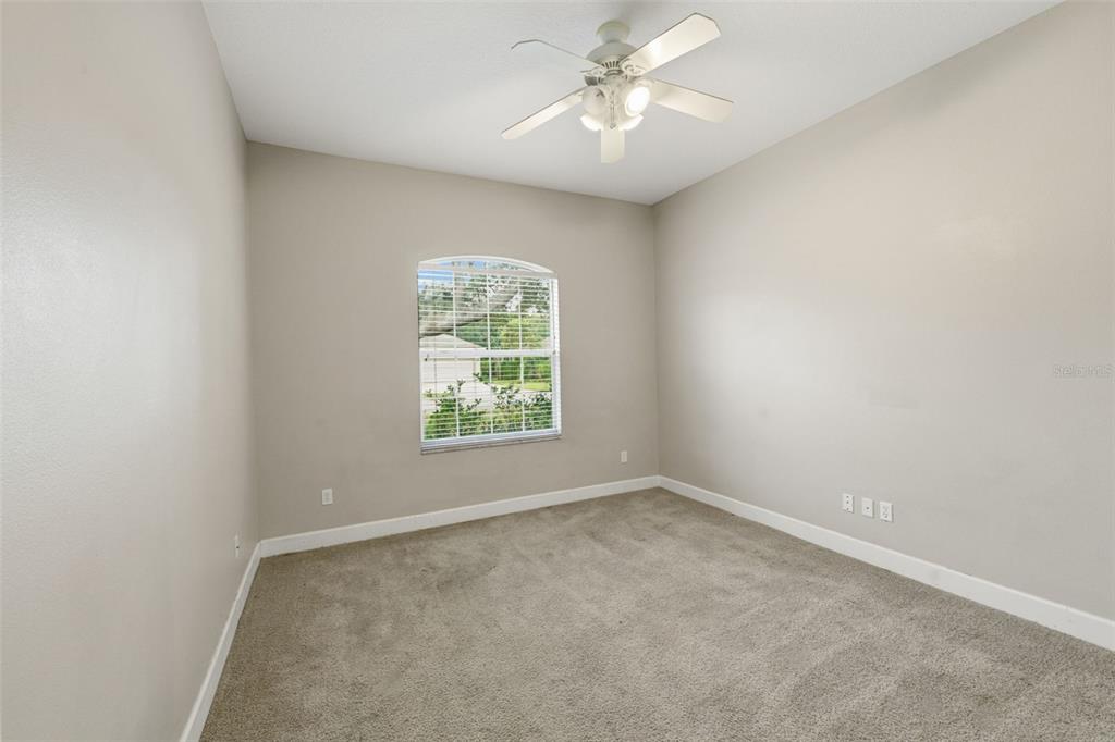 609 Renner Road Port Orange, FL 32127 - Photo 18 of 37 an empty room with a window