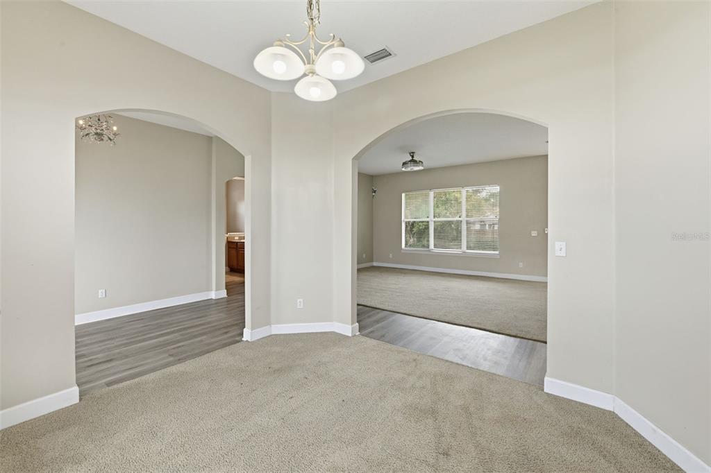 609 Renner Road Port Orange, FL 32127 - Photo 6 of 37 a view of an empty room with a window