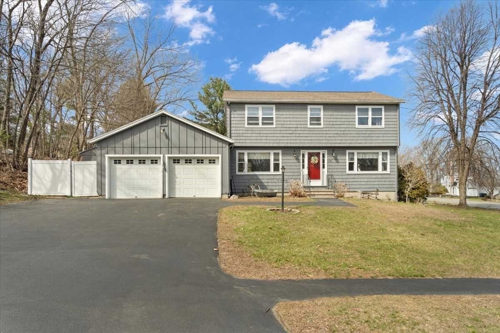 a view of house with outdoor space