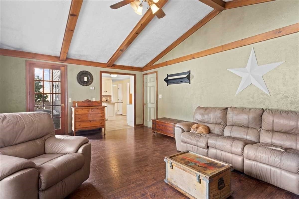 136 Winthrop Lane Holden, MA 01520 - Photo 13 of 42 a living room with furniture and wooden floor