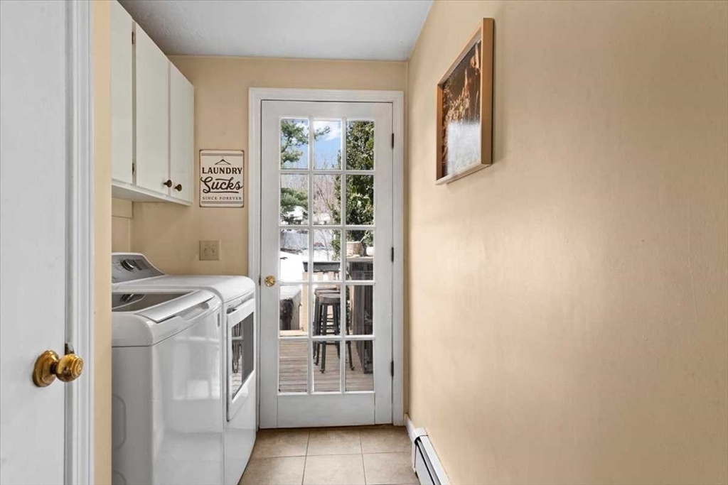 136 Winthrop Lane Holden, MA 01520 - Photo 19 of 42 a kitchen with white cabinets and white appliances