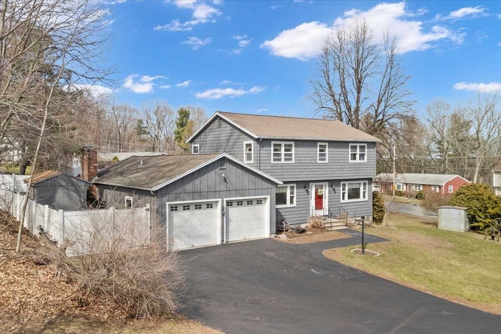 136 Winthrop Lane Holden, MA 01520 - Photo 2 of 42 a view of a town with residential house