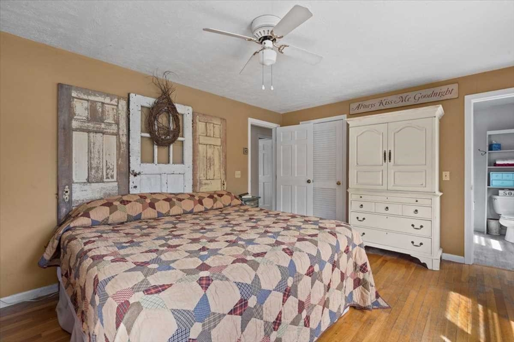 136 Winthrop Lane Holden, MA 01520 - Photo 22 of 42 a bedroom with a large bed and closet