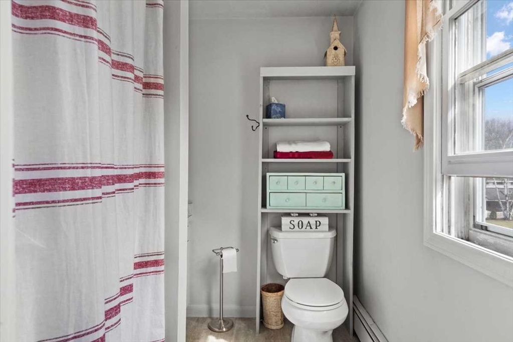 136 Winthrop Lane Holden, MA 01520 - Photo 23 of 42 a bathroom with a toilet and a sink