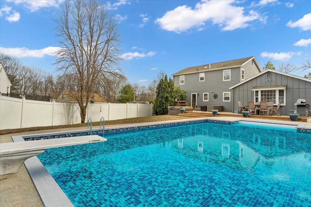 136 Winthrop Lane Holden, MA 01520 - Photo 34 of 42 a view of a big house with a big yard