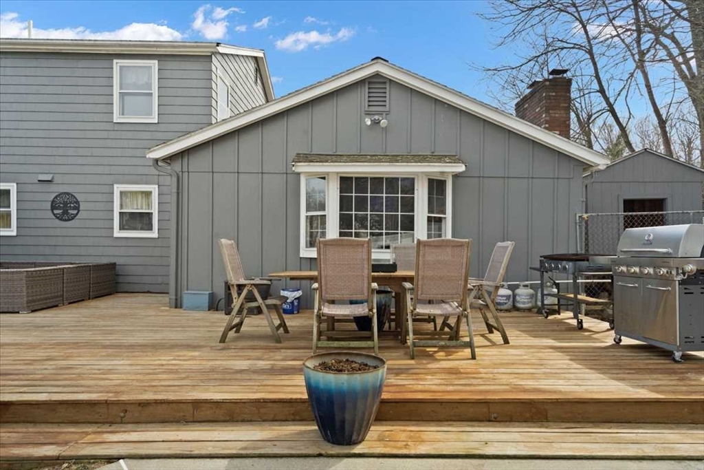 136 Winthrop Lane Holden, MA 01520 - Photo 37 of 42 a view of a patio with table and chairs